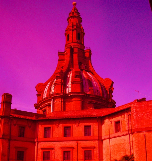 a view of the top of a building looking up