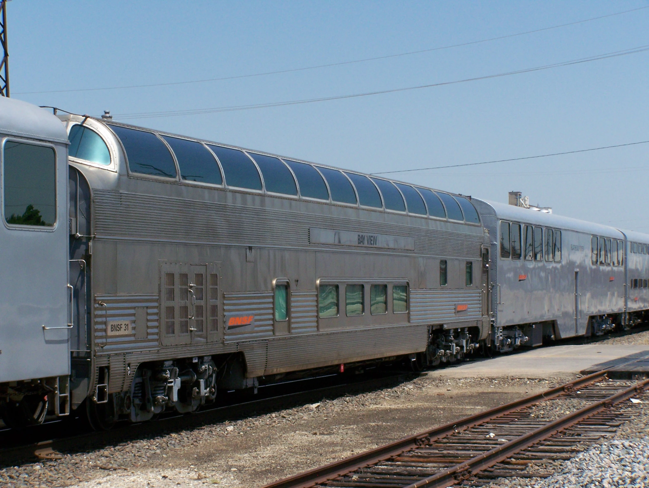 a passenger train engine pulling up to a stop