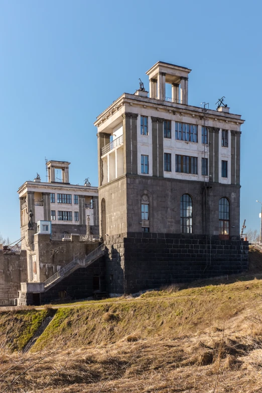 a very old building with some stairs and windows