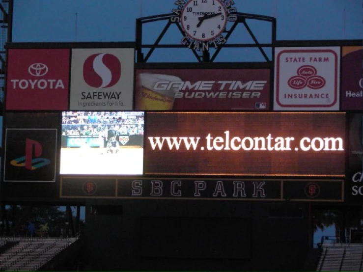 an electronic scoreboard at a sports game