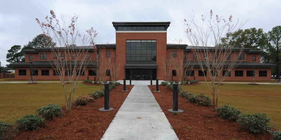 a big building that is surrounded by trees