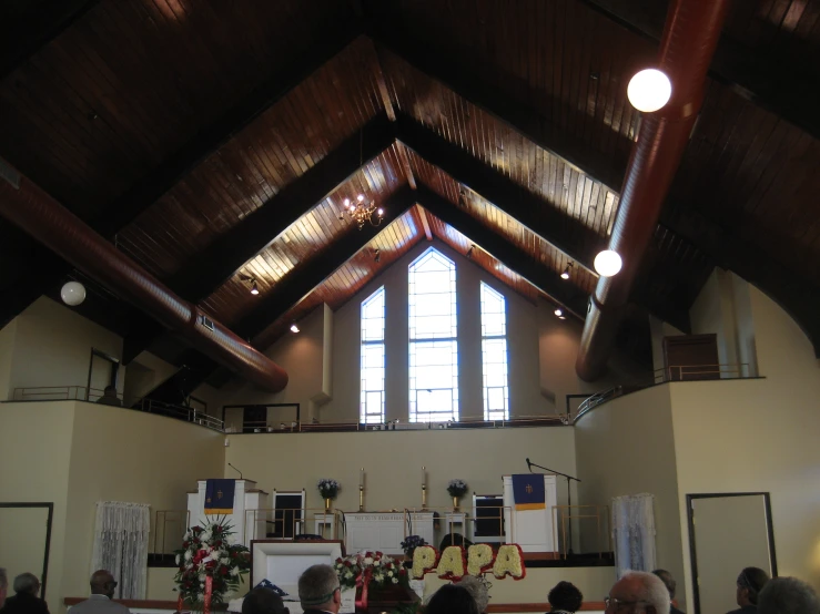 a church with several people in the pews