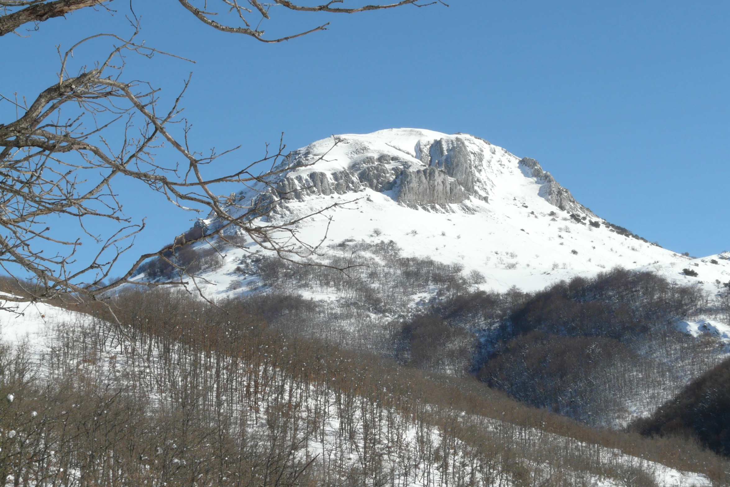 the view of the mountain is covered with snow