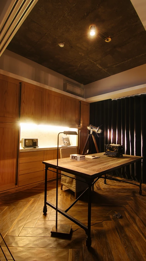 a large brown room with a black curtain and lights