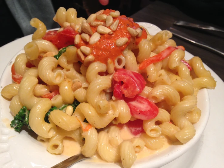 the macaroni is made with broccoli and tomato sauce