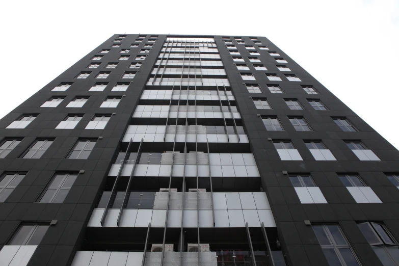 the window of the side of a building that is black and white