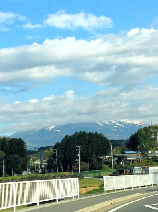 the mountains in the background are in the sky