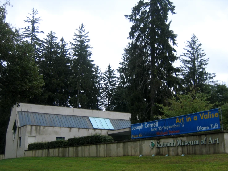 a large sign in front of an information office