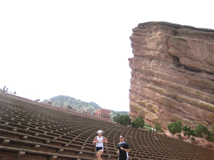 a couple of people that are walking up steps