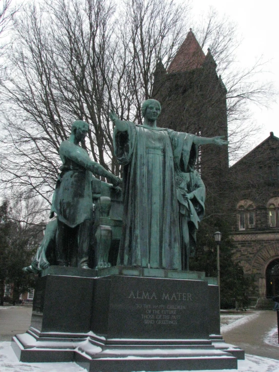 the monument is next to a building and trees