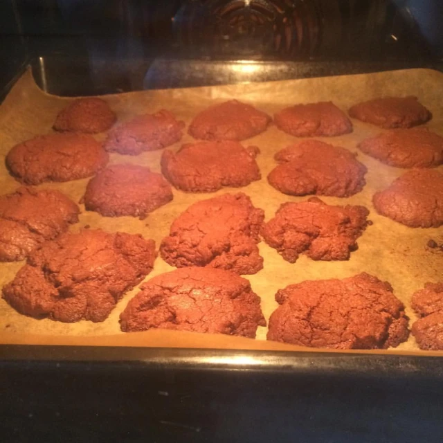 cookies on a baking sheet on an oven