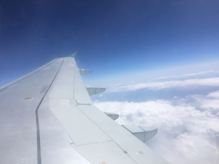 the view from the airplane window shows what is in the clouds