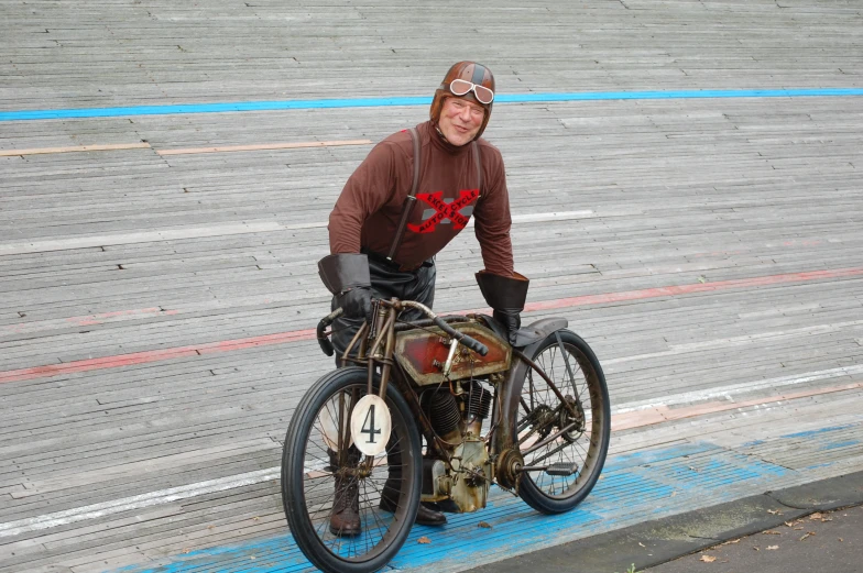 a man riding on the back of a motorcycle