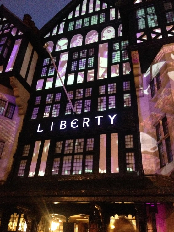 the liberty el is lit up at night