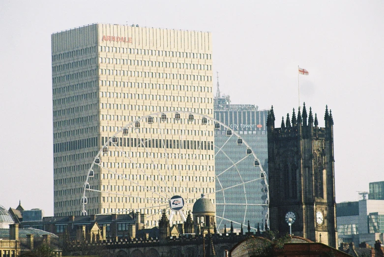 the skyline has big ben and two other skyscrs