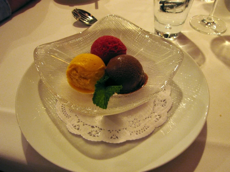 a plate with three different types of desserts on it