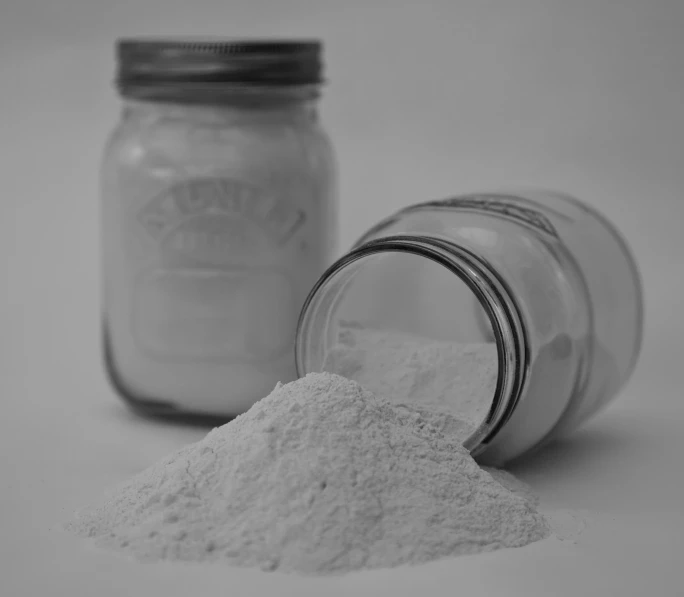 a close up of a glass jar with food