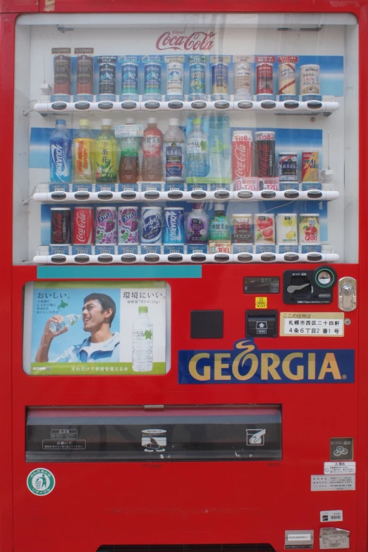 a very big pretty vending machine with a pepsi machine in front of it
