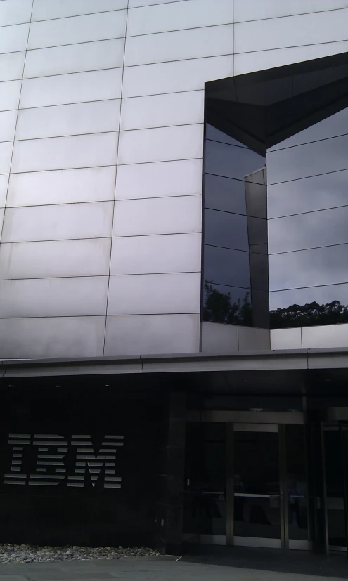 a building with an entrance and glass doors