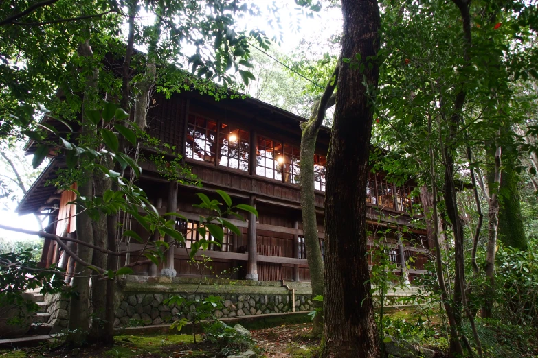 a large house in the middle of the woods