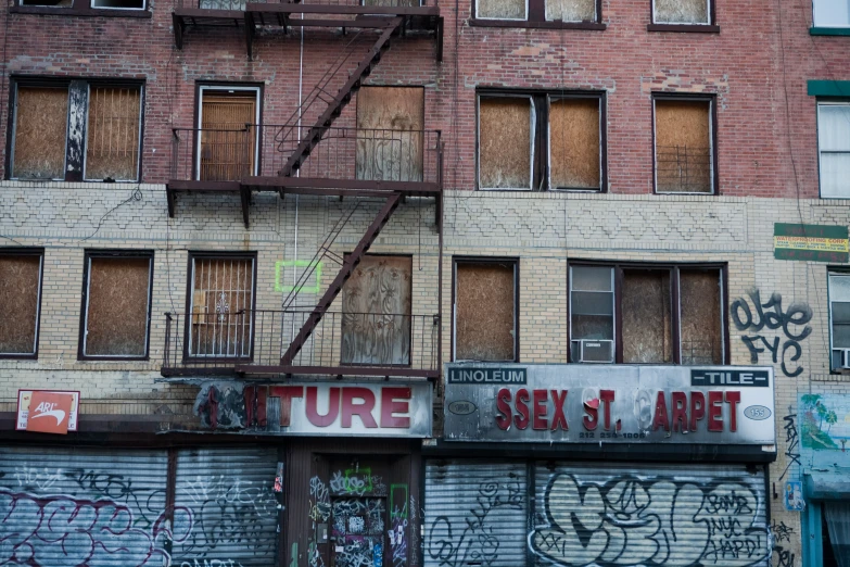 a run down building has been damaged and painted brown