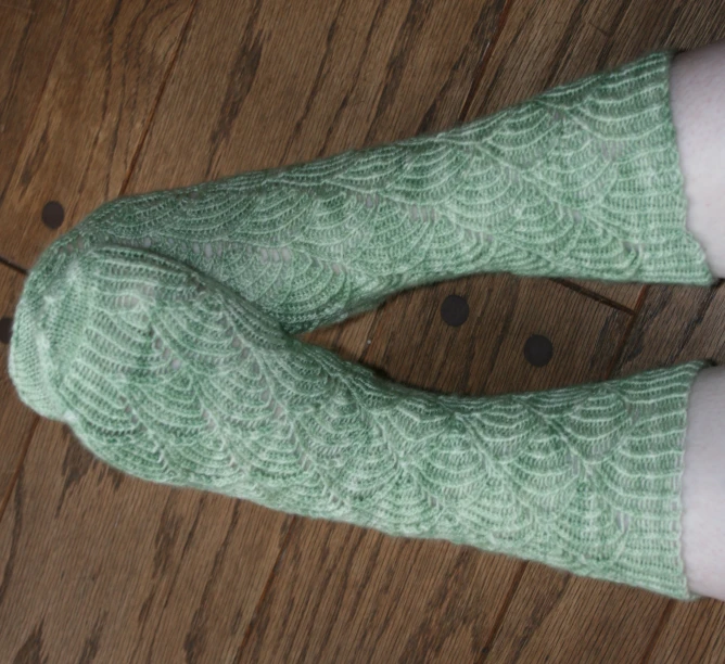 woman with green patterned socks on and legs