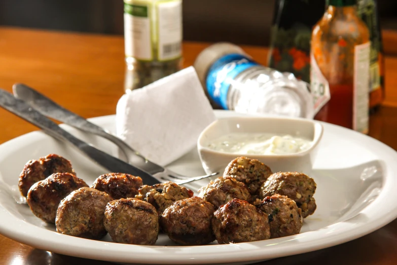 the meatball is cut in half on the plate