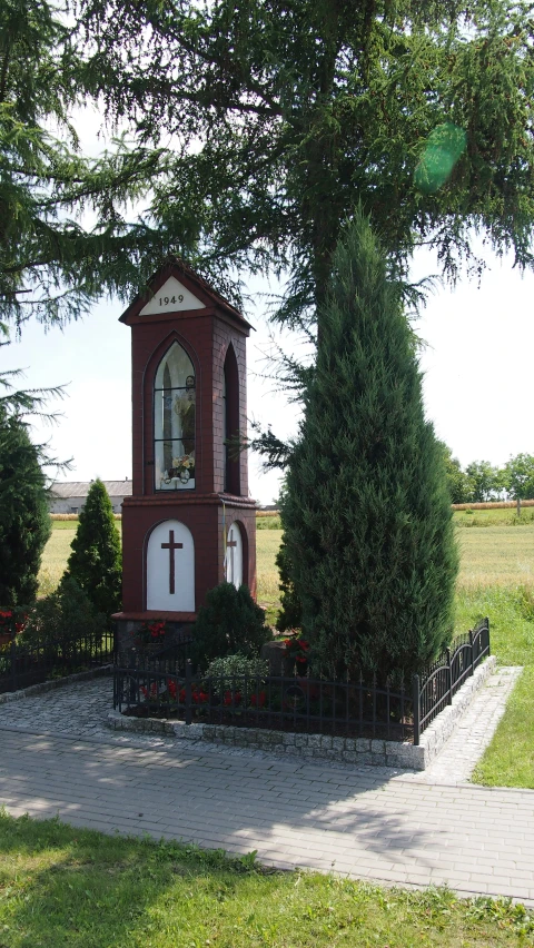 a church tower in a rural country setting