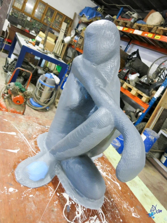 the sculpture is shaped like an elephant in the process of being worked on