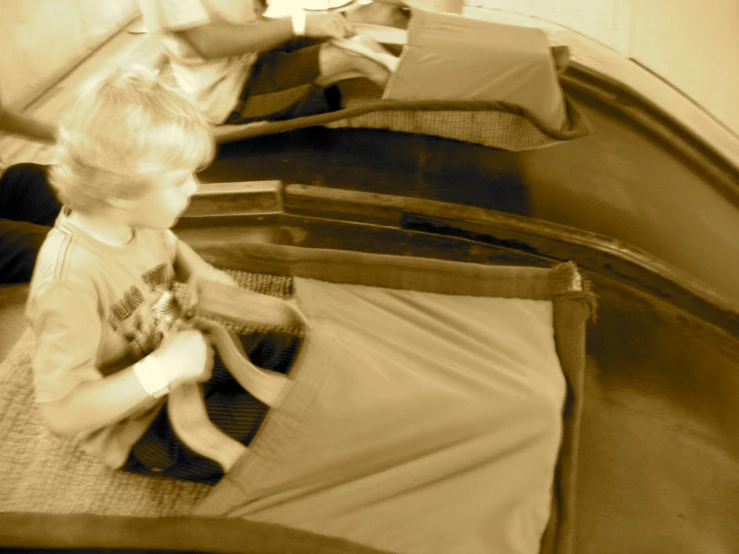 an older person reaching for soing in a suitcase