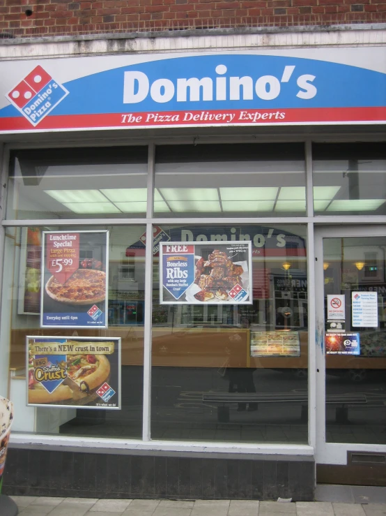 a storefront that has been closed with signs