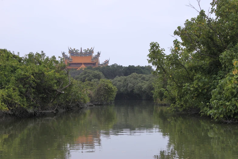 a man on horseback rides down a river