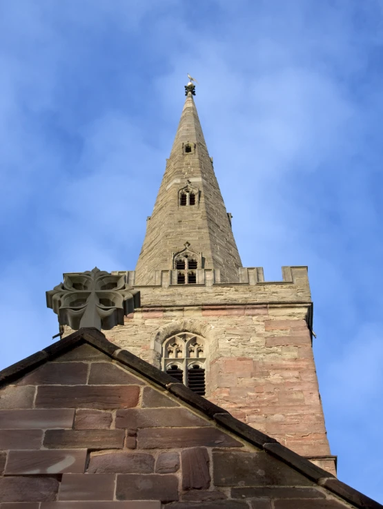 a tower with a clock on it and windows on top