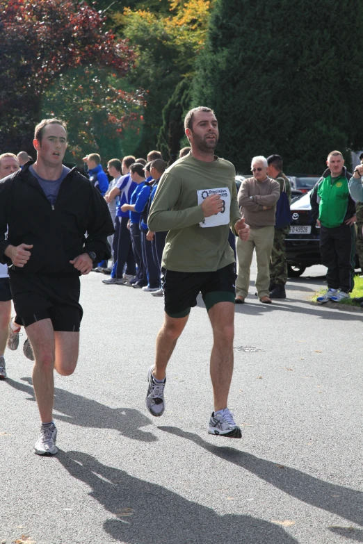 some men are running in a marathon