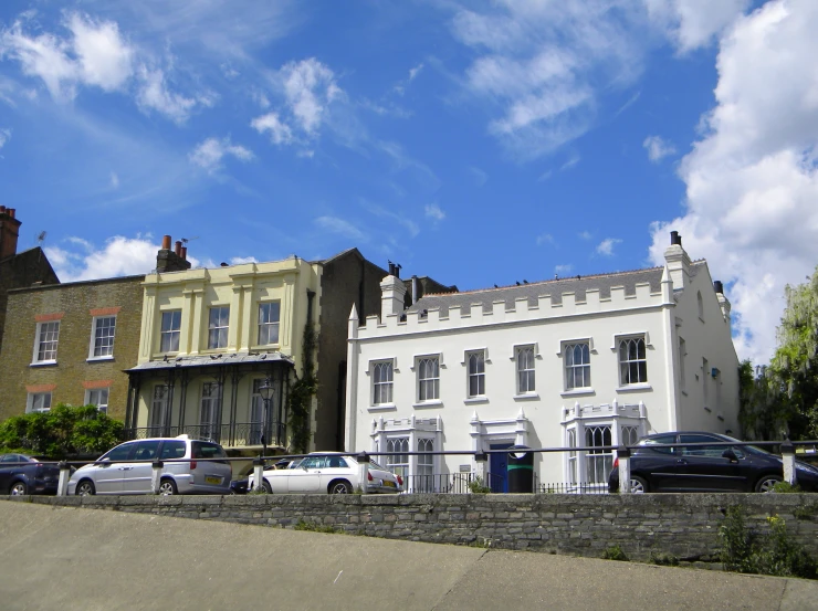 a large three story building that has been turned into a house