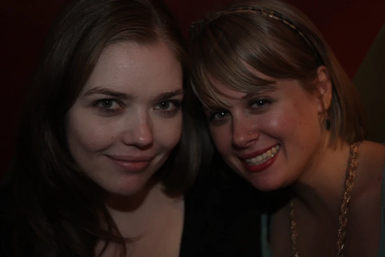 two women with big smiles on their face