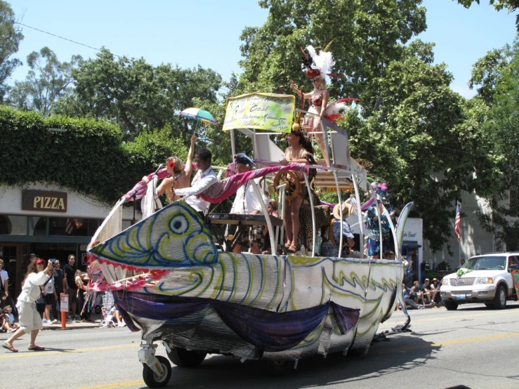 a float that has people on top is in the street