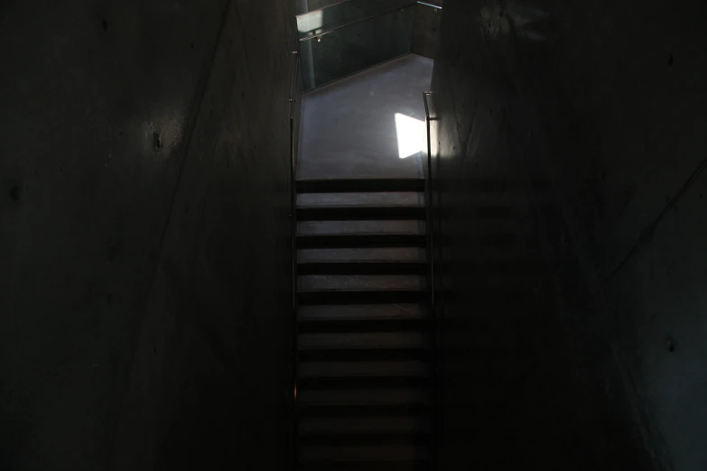 the stairs are empty in the dark area