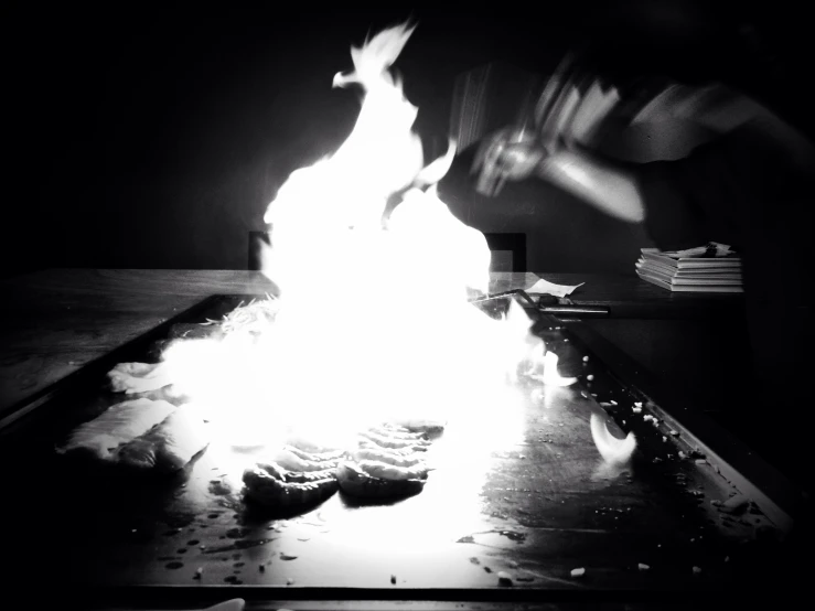 a black and white po of a lit table