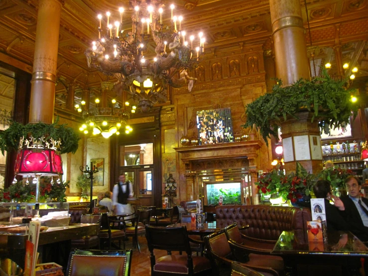 some fancy restaurant tables and chairs are shown