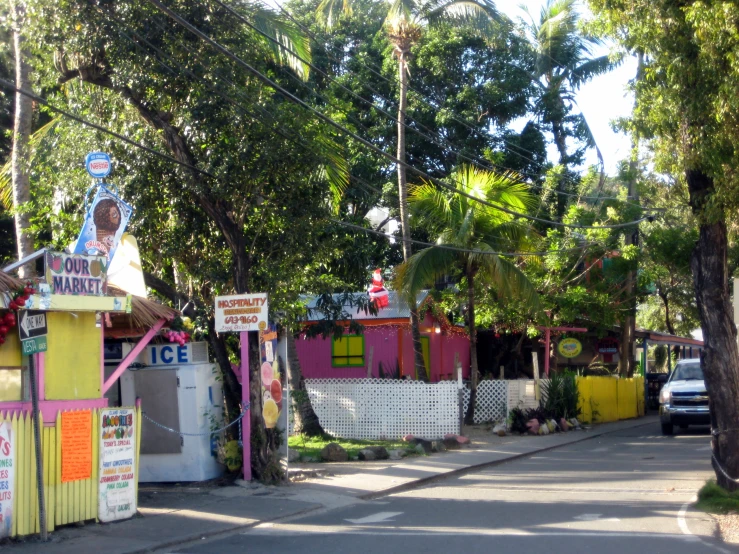 several signs are placed on the side of the street