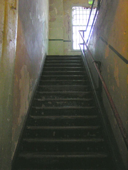 dark stairs leading up to the second floor