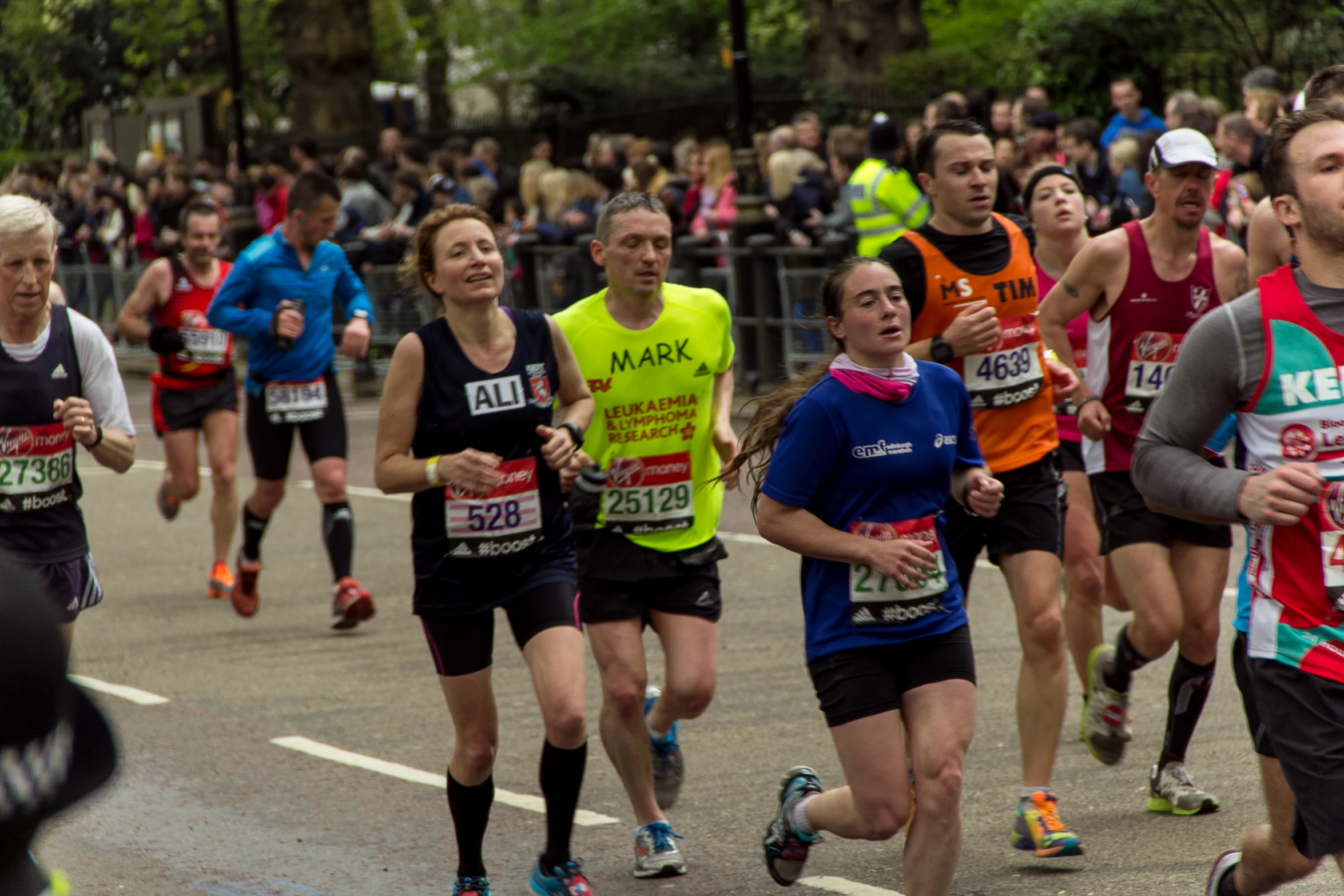 a marathon with some runners running down the street