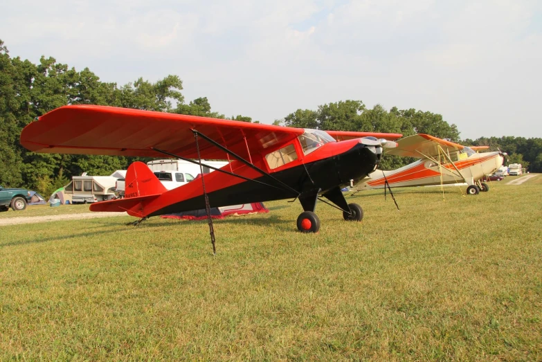 a small plane on display in a field