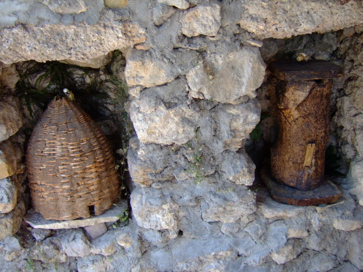 there are two brown vases on the wall