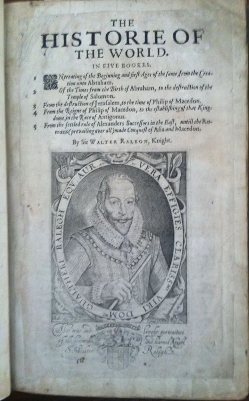 an old black book with a white drawing of king charles vi, in the corner