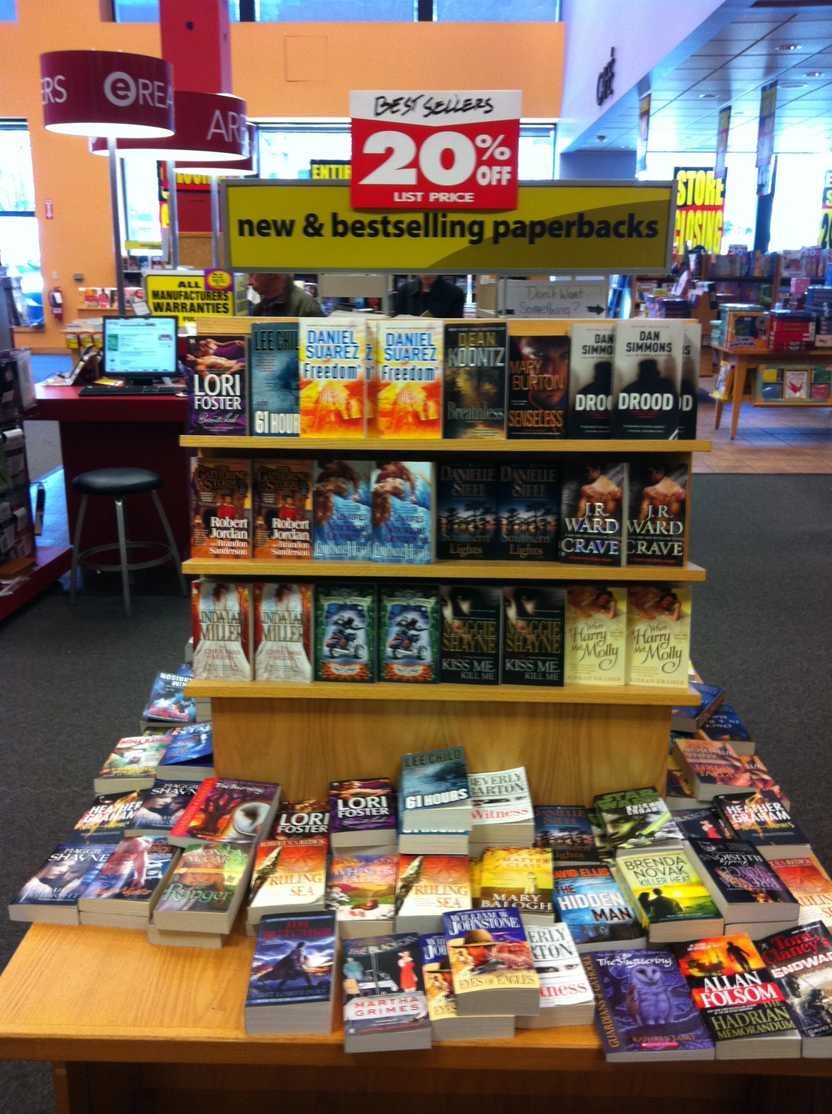 a store display of books and magazines on the shelf