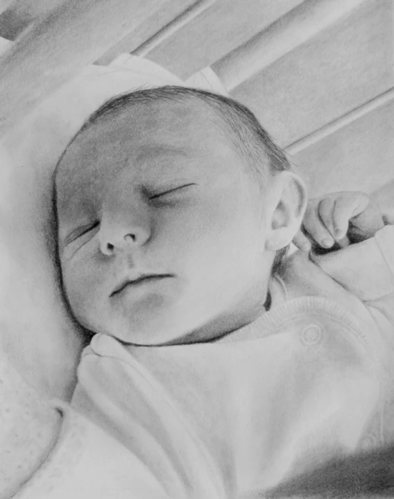 a baby sleeping in the crib while wearing a hat