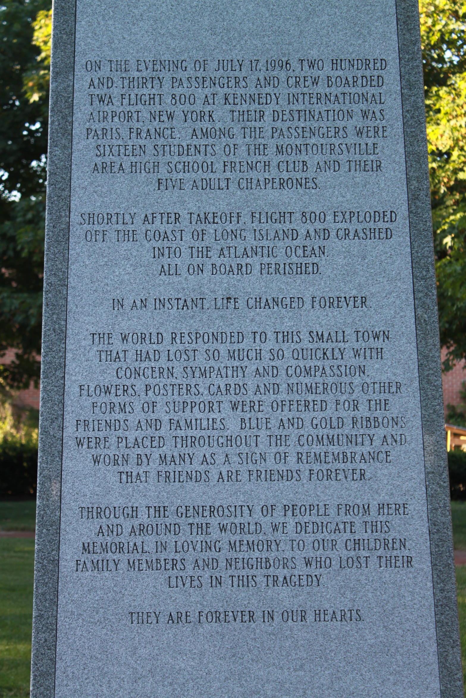 a very detailed monument on a park side