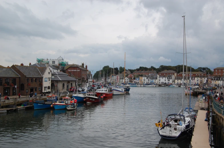 a large harbor filled with boats and small buildings